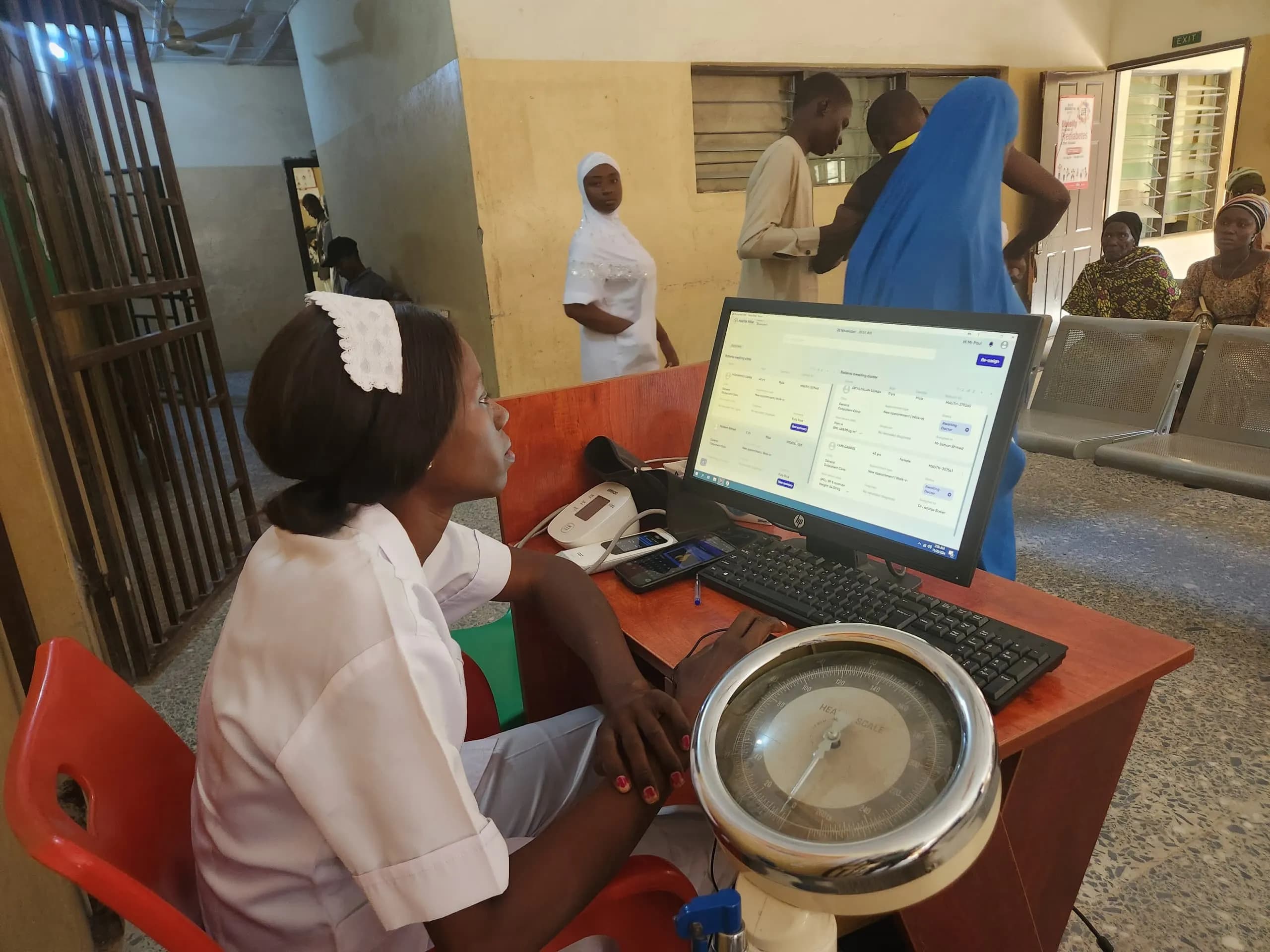 Nurse entering patient data